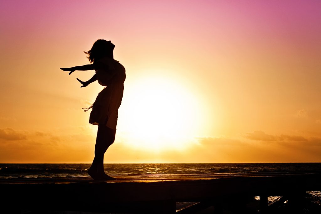 beach woman sunrise silhouette 40192 1024x683 1